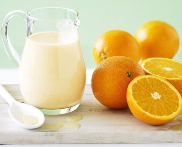 Cách trị nám gò má tại nhà bằng sữa tươi và cam